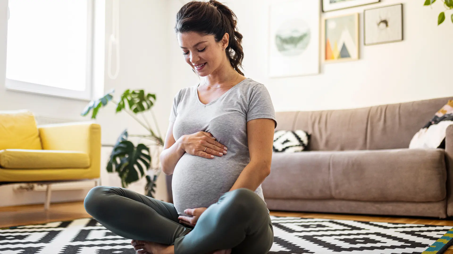 A pregnant woman practicing Garbh Sanskar for healthy pregnancy.