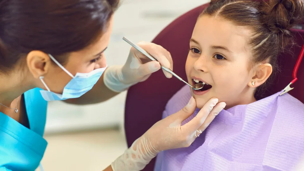 Borneo Hospital showing 5 expert tips for kids dental care to prevent cavities, including brushing, diet, and dental sealants.